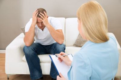 man in depressed with a psychiatrist